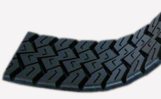 What reclaimed rubber can be used to prepare truck tire tread rubber from natural rubber