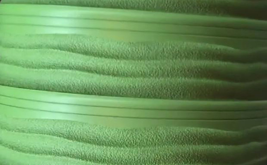 Green rubber shoes around the strip glue