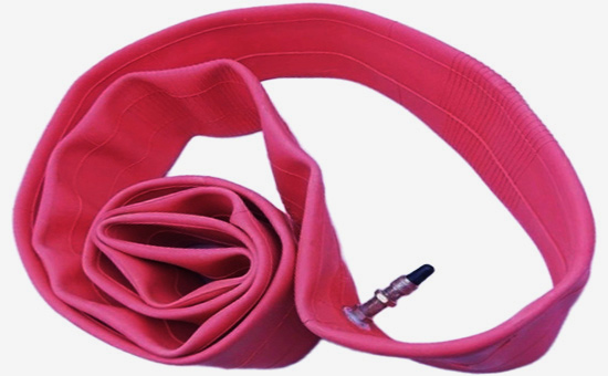 Red bicycle inner tube mixed with recycled rubber