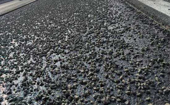 Rubber powder modified asphalt pavement laying